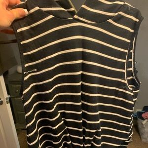 Sleeveless navy blue and white striped shirt
